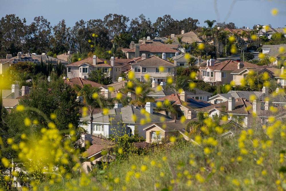 Aerial view of an Irvine, California residential neighborhood with modern suburban homes