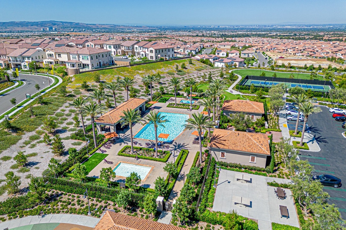 Aerial view of Portola Springs in Irvine showing homes, a neighborhood park, and playground.