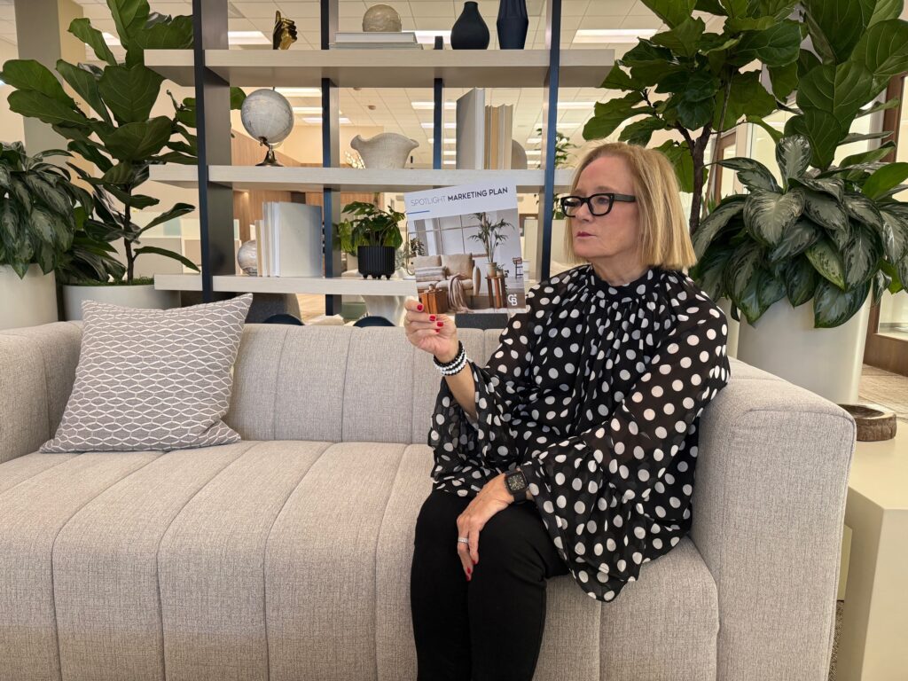 Debbie Sagorin reviewing Irvine real estate market data for home sellers